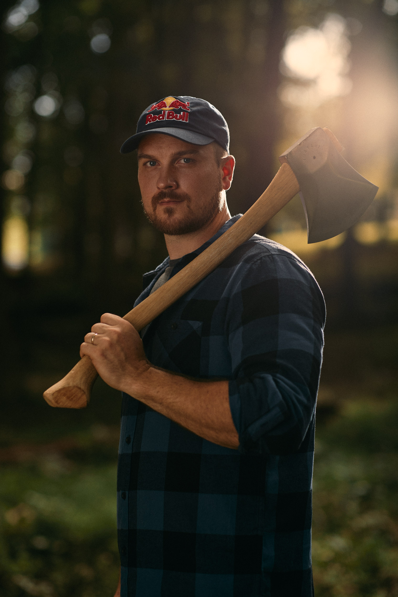 RED BULL ACTION SPORTS PHOTOGRAPHY OF WORLD CHAMPION TIMBERSPORTS ATHLETE MATT COGAR BY COMMERCIAL SPORTS ADVERTISING PHOTOGRAPHER SHAWN HUBBARD