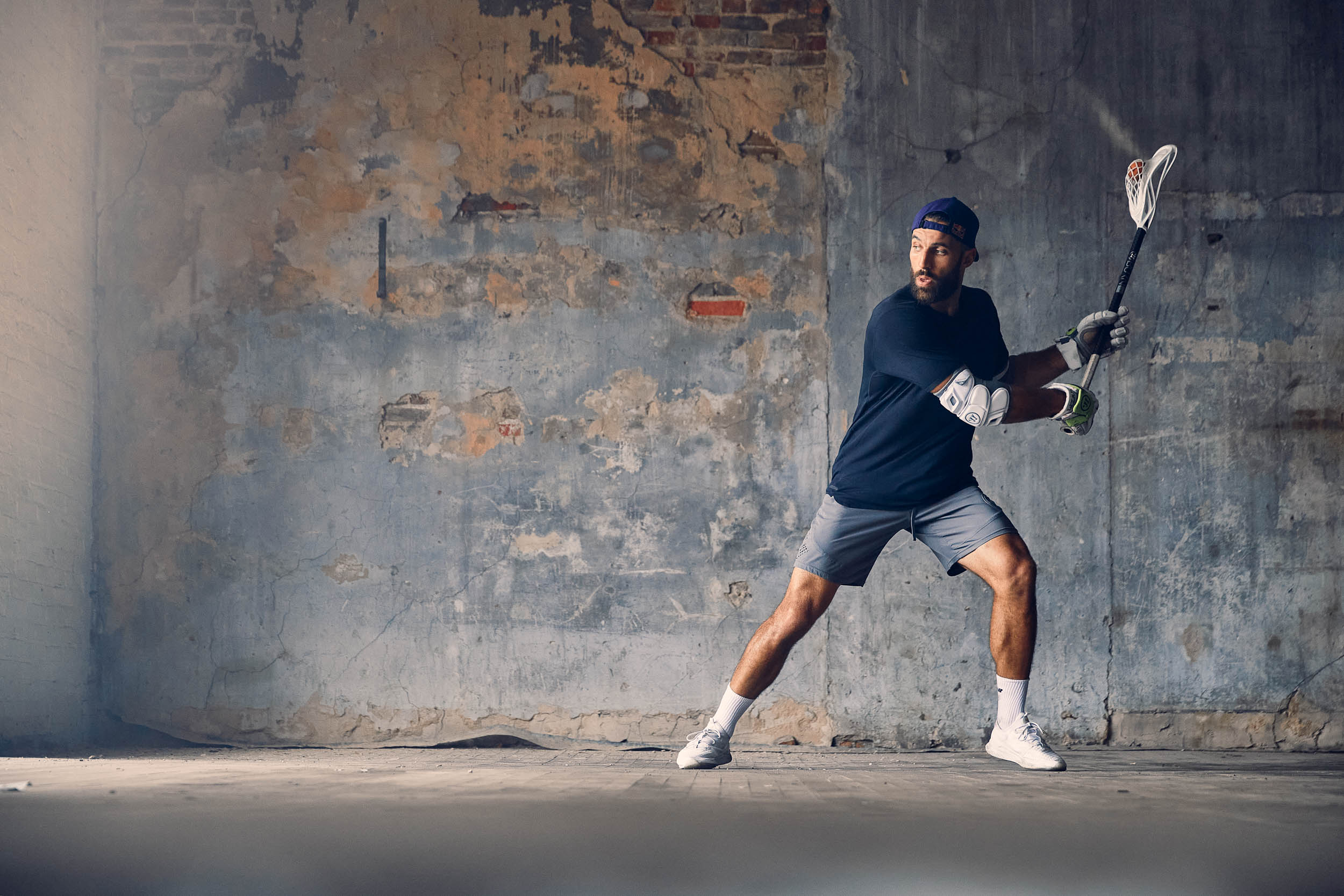 RED BULL ACTION SPORTS PHOTOGRAPHY OF WORLD CHAMPION LACROSSE ATHLETE PAUL RABIL FOUNDER OF PREMIERE LACROSSE LEAGUE BY COMMERCIAL SPORTS ADVERTISING PHOTOGRAPHER SHAWN HUBBARD