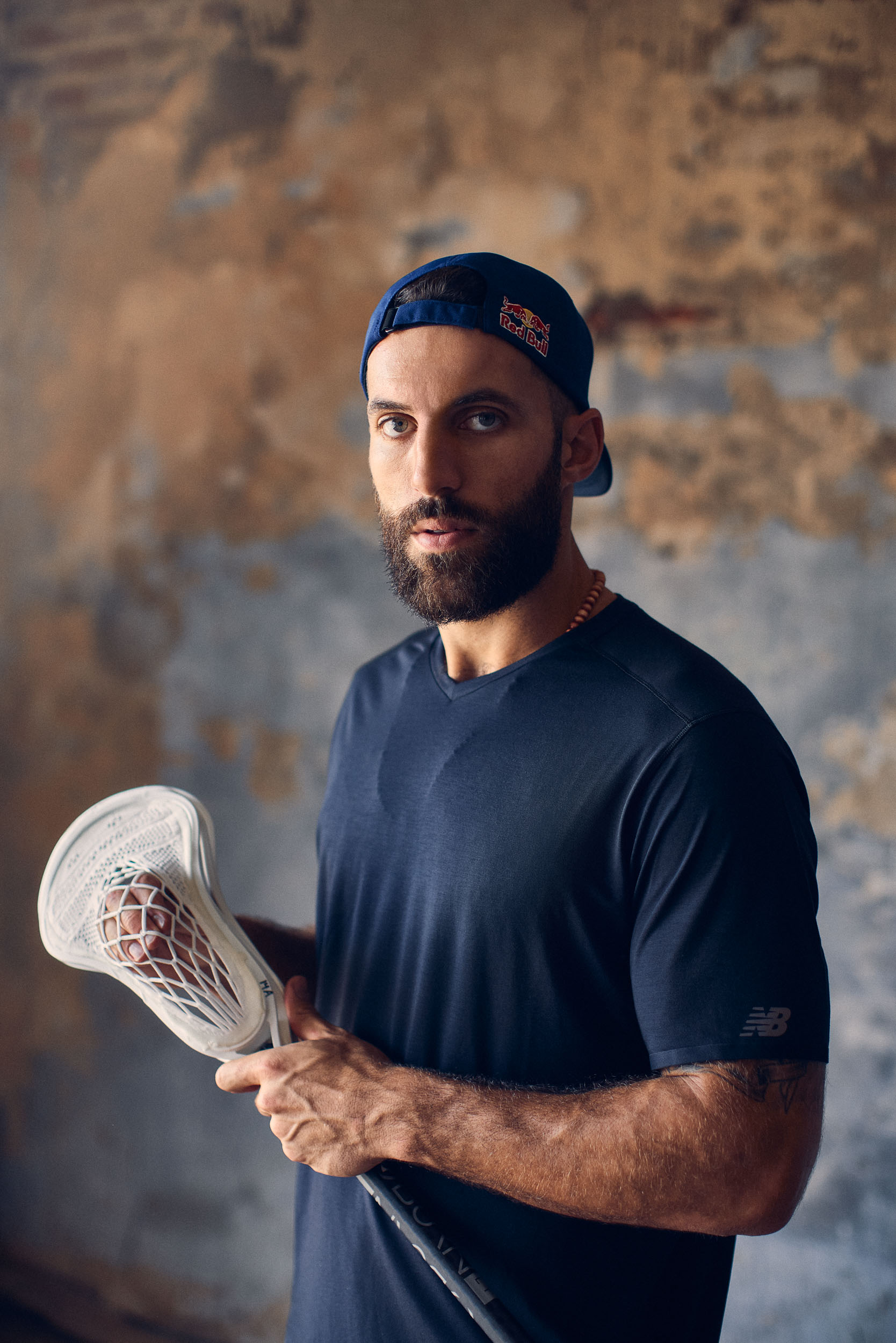 RED BULL ACTION SPORTS PHOTOGRAPHY OF WORLD CHAMPION LACROSSE ATHLETE PAUL RABIL FOUNDER OF PREMIERE LACROSSE LEAGUE BY COMMERCIAL SPORTS ADVERTISING PHOTOGRAPHER SHAWN HUBBARD