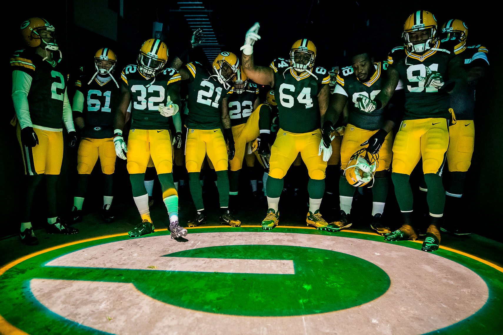 Best photos of the Green Bay Packers NFL football team wearing Nike football uniforms photographed by  commercial sports advertising photographer in maryland