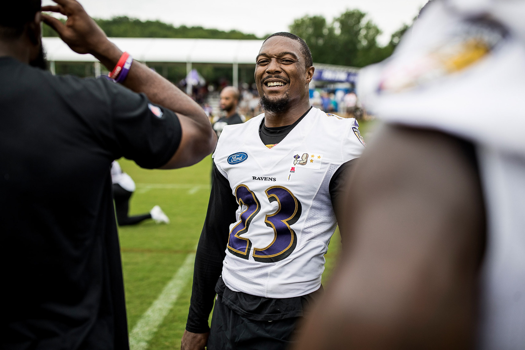 A day in the life of NFL training camp documentary story Baltimore photojournalist Shawn Hubbard