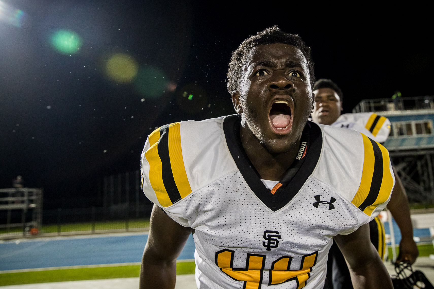stfrances33_ St Frances Academy Panthers football Baltimore City poverty ESPN documentary MIAA Champions youth football team versus IMG Academy football Bradenton Florida Under Armour emotional sports photography